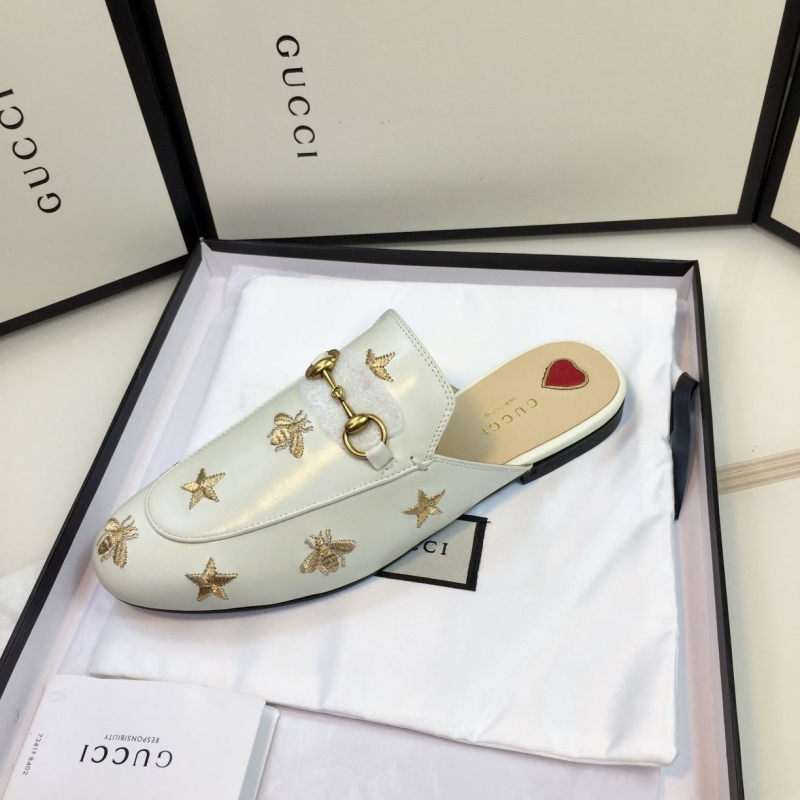 G*u*i slippers